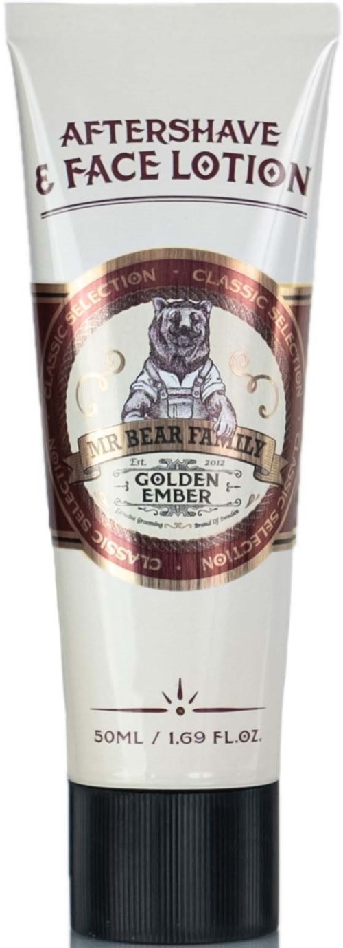 A white tube of aftershave and face lotion with a bear logo and text about a golden ember scent.