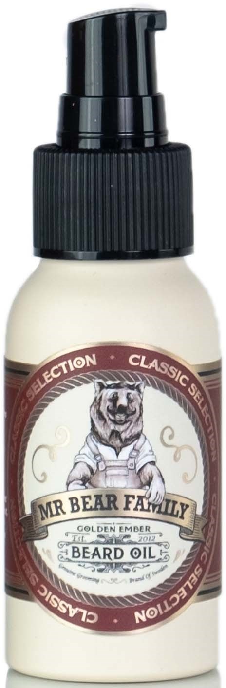 En liten flaska med svart pump och en björnillustration, märkt 'Mr Bear Family Beard Oil', som antyder att den är för skäggvård.