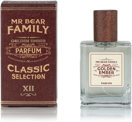 A perfume bottle with a wooden cap next to its red box, both labeled 'Mr. Bear Family Golden Ember Parfum Classic Selection.'
