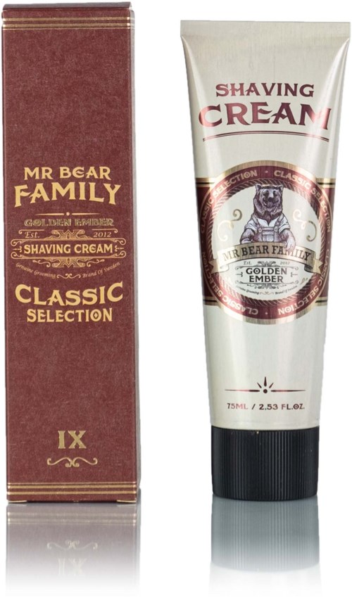 A tube of shaving cream and its box, both with a bear logo, classic design, and brown, white, and black colors.