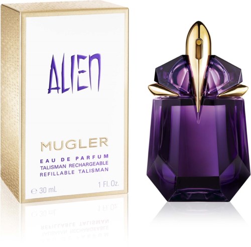 Een paarse parfumfles in de vorm van een alienhoofd met een gouden top, naast een doos met "Alien Mugler".