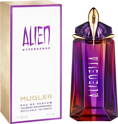 Een parfumfles met paarse en rode kleuren, een gouden accent en het woord 'ALIEN' erop, naast een witte doos.