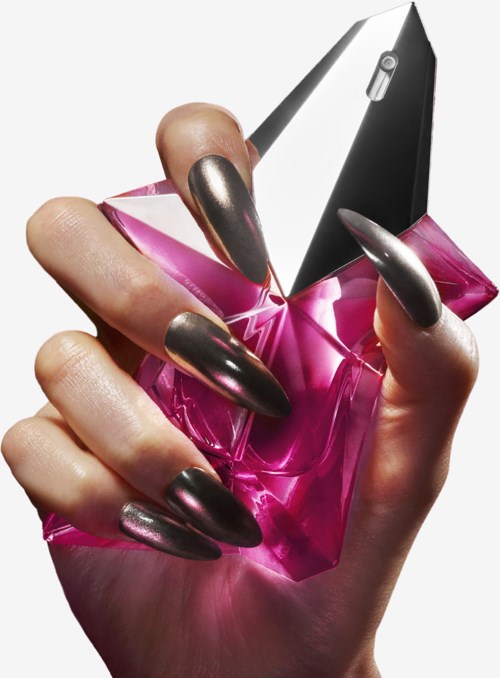 A hand with black painted nails holds a pink gemstone with a black and silver sleek makeup compact or similar item.