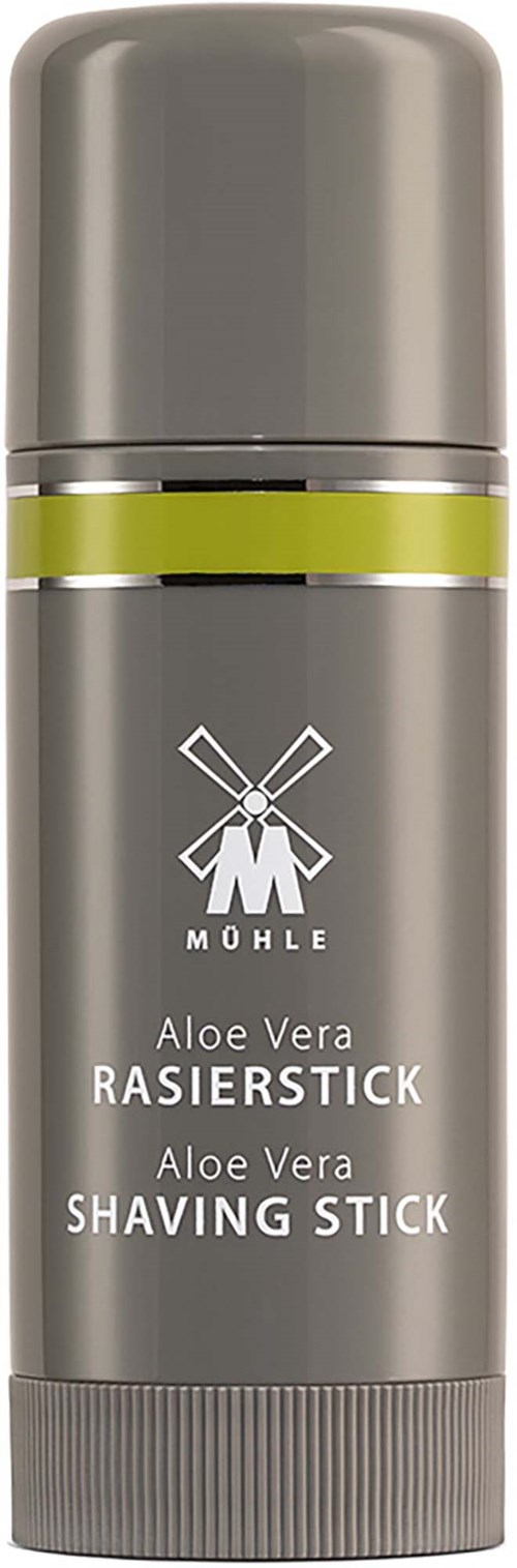 Ett grått rakstiftbehållare med en grön rand och en väderkvarnslogo, märkt Aloe Vera Raserstick.