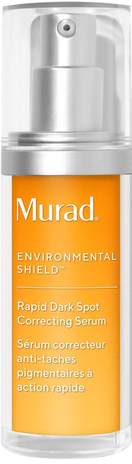 Een kleine oranje fles met een zilveren dop, label zegt Murad Environmental Shield, tegen donkere vlekken corrigerend serum.