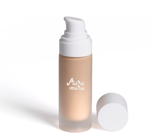 A beige liquid foundation bottle with a white pump and a white cap beside it.