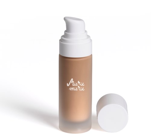 A bottle of liquid makeup or foundation with a pump and a separate white cap.