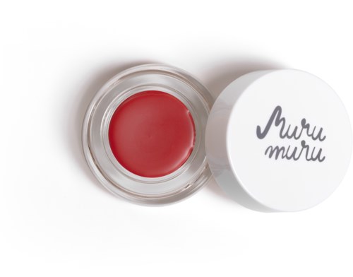 Ein kleiner Behälter mit roter Creme oder Gel mit weißem Deckel, auf dem 'Muru muru' in Grau geschrieben steht.