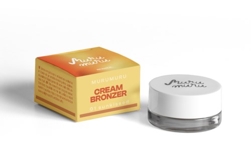 A small jar of cream bronzer and a matching box, both with the brand name Murumuru, placed on a white surface.