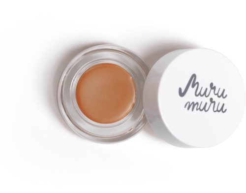 A small jar of beige-colored cream or balm with a lid that says "Muru Muru" on it.