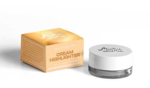 Cream highlighter in a small jar and box with soft lighting and shadows.