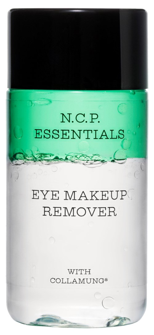 Een klein flesje met groen en wit label, met oogmake-up verwijderaar met bellen erin.