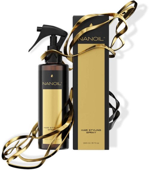 A black and gold hair styling spray bottle with a box and gold ribbon decoration.