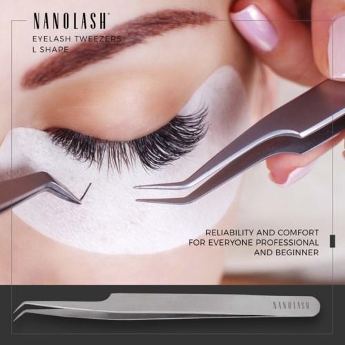 Eyelash tweezers and tools are used on a person's closed eye, with a white pad underneath.