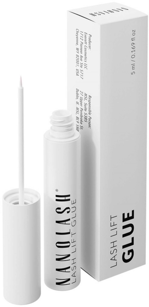 Een witte nagellijm tube met kwast en de doos zijn zichtbaar. De doos heeft zwarte en grijze tekst.