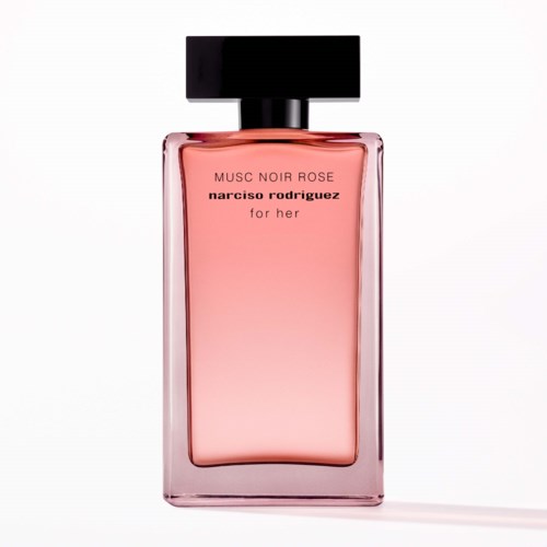 Roze parfumfles met zwarte dop, met label 'MUSC NOIR ROSE narcisso rodriguez for her.'