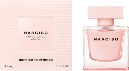 Een parfumfles en doos, beide roze en gelabeld 'Narciso Rodriguez Eau de Parfum Crystal,' met een eenvoudig, elegant ontwerp.