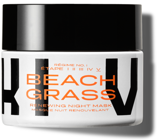 Ein kleiner Behälter mit Beach Grass Renewing Night Mask in schwarzer und weißer Verpackung mit orangefarbenem Text.