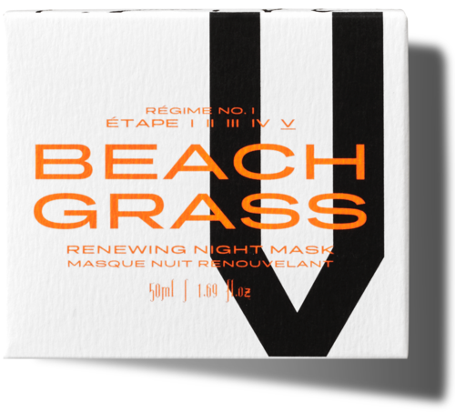 Ein Verpackungsetikett mit orangefarbenem und schwarzem Text, erwähnt Beach Grass und erneuernde Nachtmaske. Es hat eine große schwarze V-Form.