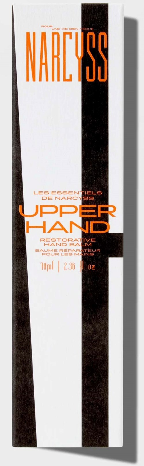 Eine lange Schachtel mit orange und schwarzem Text, mit einem schwarzen Streifen in der Mitte, bewerben Hautpflegeprodukte.