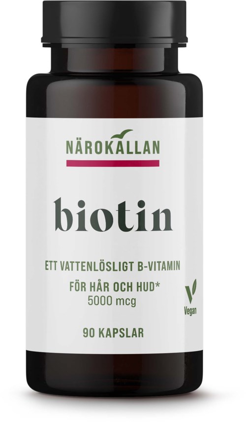 En brun flaska med en vit etikett som säger att den innehåller biotin kapslar för hår och hud, vegansk, 90 kapslar.