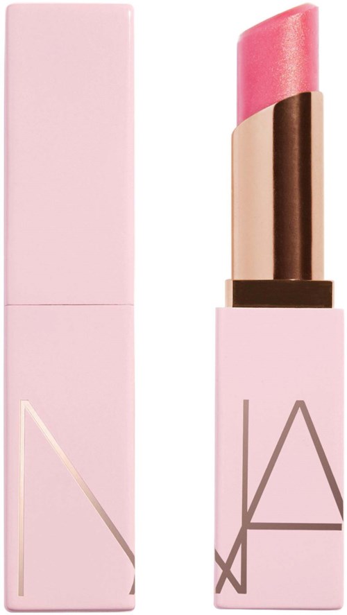 A pink lipstick with a silver logo on the tube and cap, shown next to its closed box.