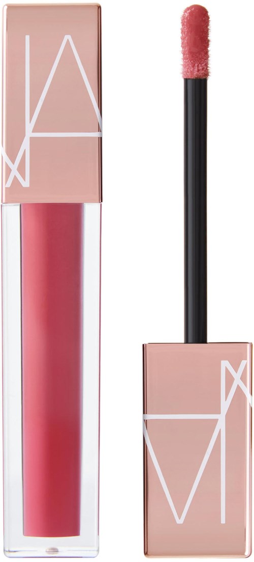 A liquid lipstick in a clear tube with a pink shade. It has a pink cap with white geometric lines and an applicator.