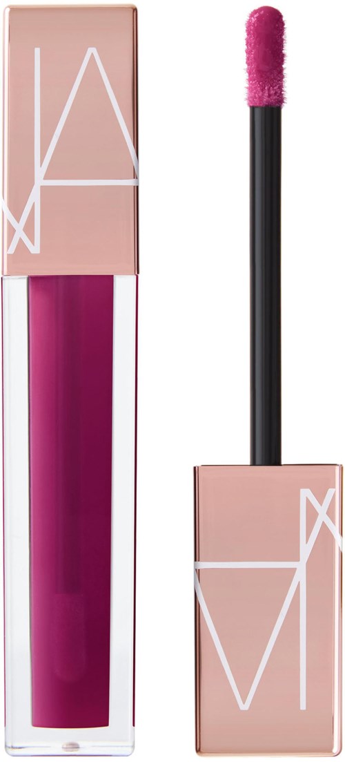 Pink lip gloss with a black applicator and a matte pink cap featuring white geometric lines.