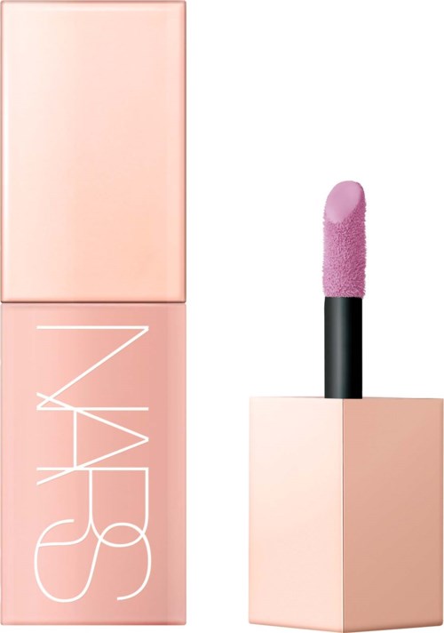 A pink nude lipstick with the cap removed, showing the lipstick inside. The lipstick is a soft pink color.