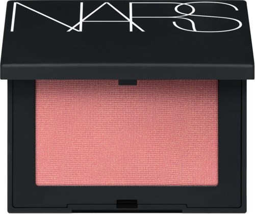 A makeup blush compact with a black case and a pink powder inside. NARS logo on the lid.