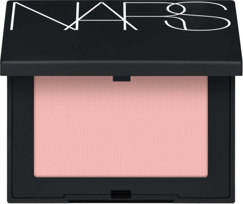 A compact NARS blush with a light pink shade and black case featuring white logo.