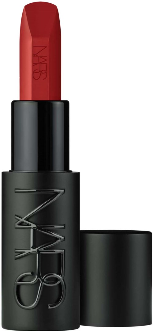 A red NARS lipstick in a black tube with the NARS logo. The lipstick is extended out of the tube.