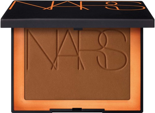 A NARS makeup compact with brown pressed powder and embossed brand name inside.