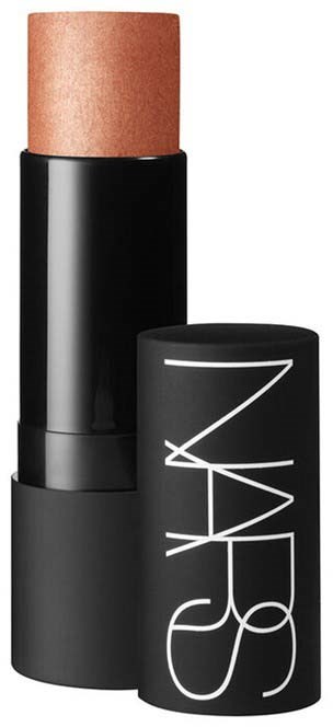 En svart NARS läppstiftstift med beige eller peachfärgad läppstift inuti, utan lock.