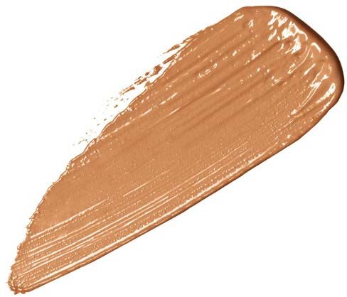 A smear of light brown makeup or foundation on a white background.