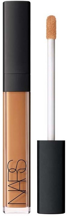 A concealer or liquid foundation in a glass tube with a black top and a doe-foot applicator.
