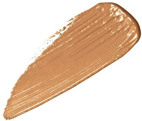 A beige makeup product, probably foundation, spread in a thick line with visible brush strokes.