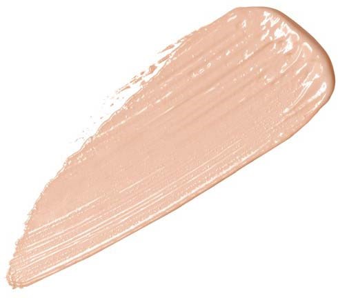 A beige-colored cosmetic cream or foundation smear with a smooth, curved shape and a shiny texture.