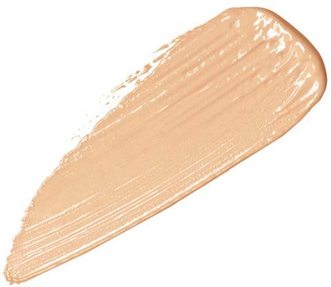 A beige liquid spread in a teardrop shape with glossy texture, likely skin or foundation makeup.
