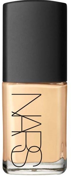 NARS foundation bottle with black cap and beige liquid inside.