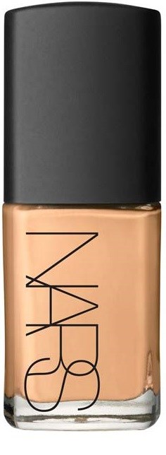 A nail polish bottle with a black cap and beige liquid inside. The brand name NARS is written on it.