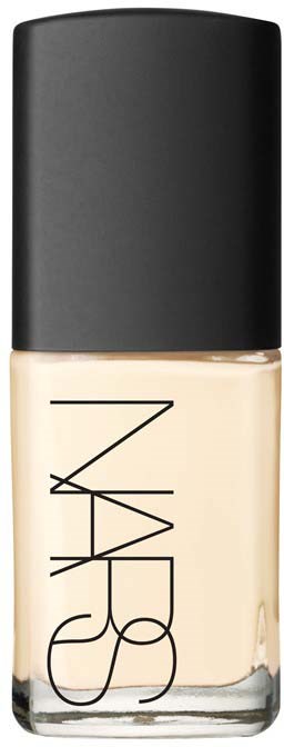 NARS foundation bottle with black cap, beige liquid inside, simple design, brand name on the bottle.