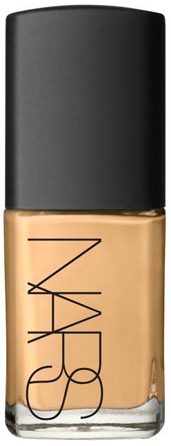 A bottle of NARS foundation with a black cap and beige liquid inside.