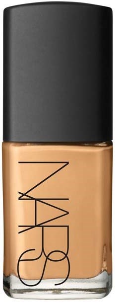 A NARS foundation bottle with a black cap, beige liquid inside, and the NARS logo on the front.
