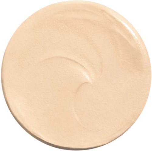 A round beige dish with some curved lines inside, possibly for holding food or liquids.
