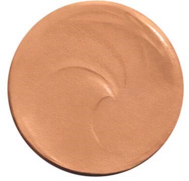 A round makeup product in a beige shade with smooth, creamy texture.
