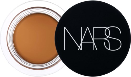 NARS logo next to a container of makeup, showing a beige color cream inside.