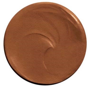 A round, brown makeup product with a smooth, creamy texture and a swirl pattern on top.