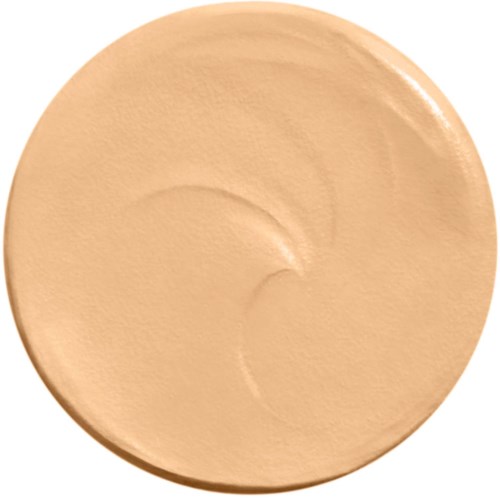 A round, beige makeup compact with a smooth, shiny surface and slight indentations. No visible label or design.