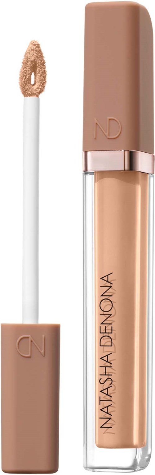 Ein flüssiger Concealer in einer beige Verpackung mit Applikatorschwamm für Make-up.
